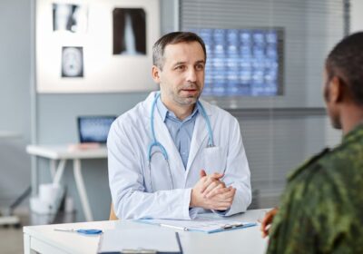 Patient speaking with a doctor about cholesterol levels