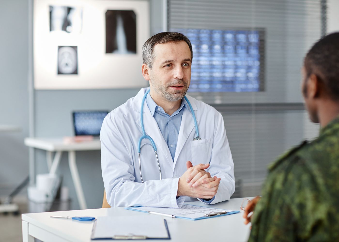 Patient speaking with a doctor about cholesterol levels